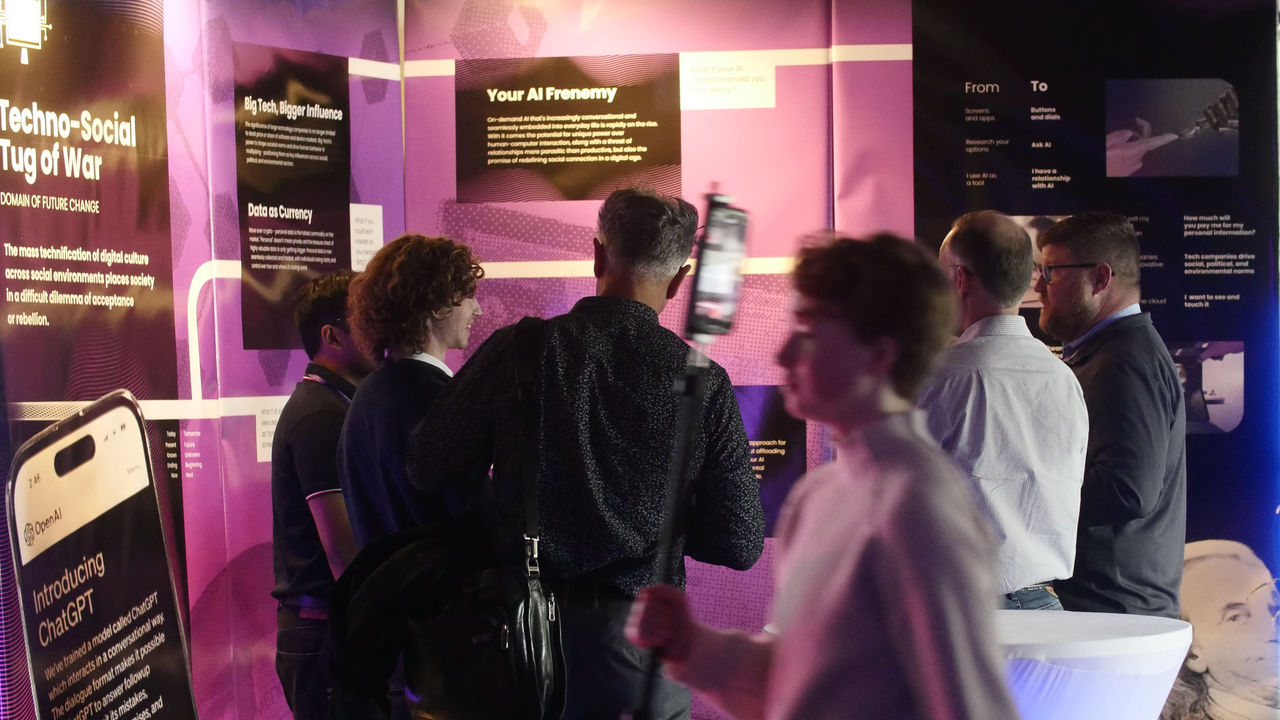 Guests reading foresights at NIS Futures Forum 2026. 