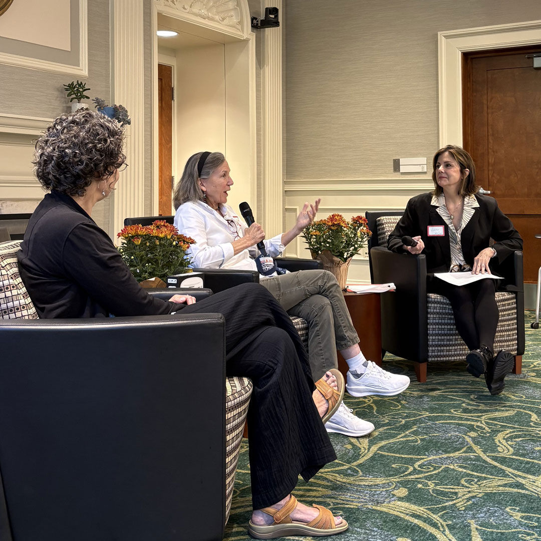 three academic professionals in discussion