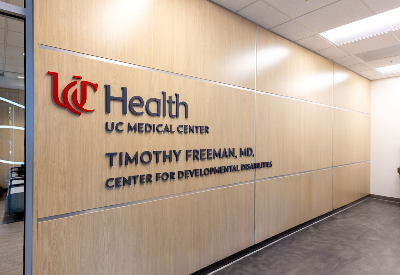 sign saying: UC Health UC Medical Center Timothy Freeman MD Center for Developmental Disabilities