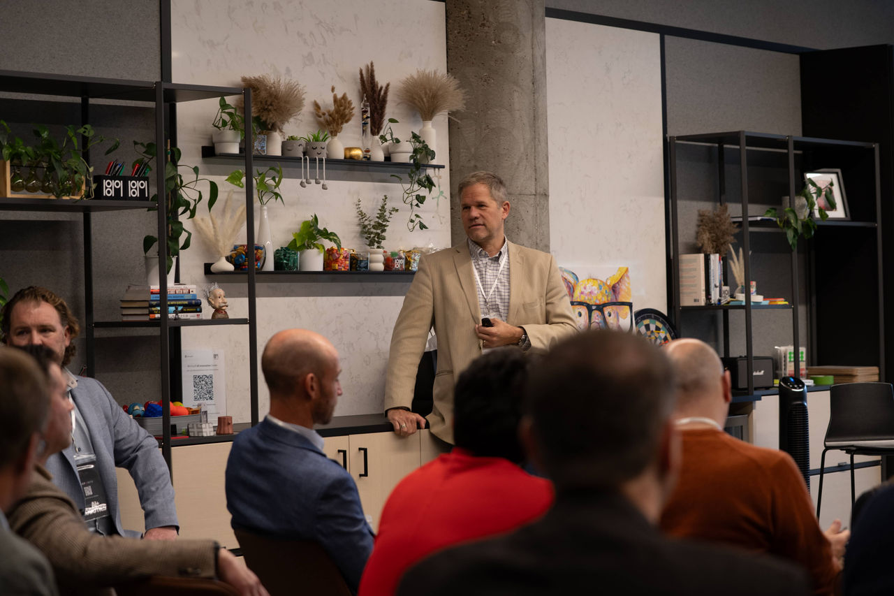 Stich presenting during the "Decoding LLMs for Commerce" session. Photo/Mary Dwyer