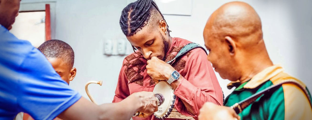 A photo of Joshua Kerobo playing the "ilu gangan" (Yoruba talking drum) at the 2024 iteration of the Nations Rhythm Festival in Ibadan, Nigeria. Photo/provided