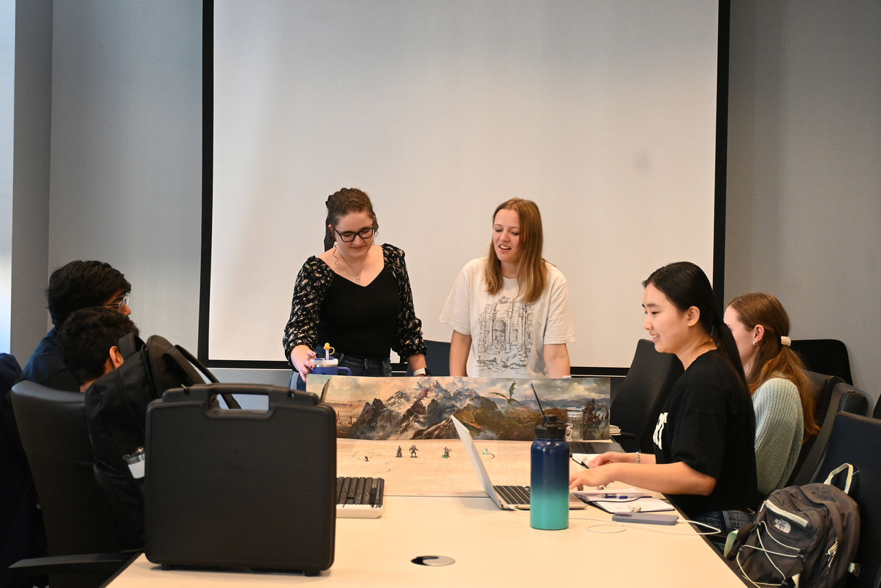 UHP students play D&D during a Tales of Resilience session
