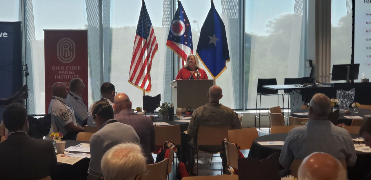 Showing CECH Dean Lisa Huffman addresing  a room of people at the Ohio Cyber Guardian 2026 event.