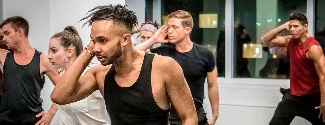 New CCM faculty member Brandon Kelly works with students in a rehearsal. Photo/Justin Brown