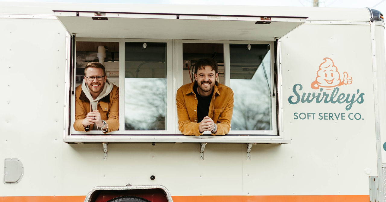 Chase Dawson and Alex Yocum inside of their Switley's Soft Serve ice cream truck