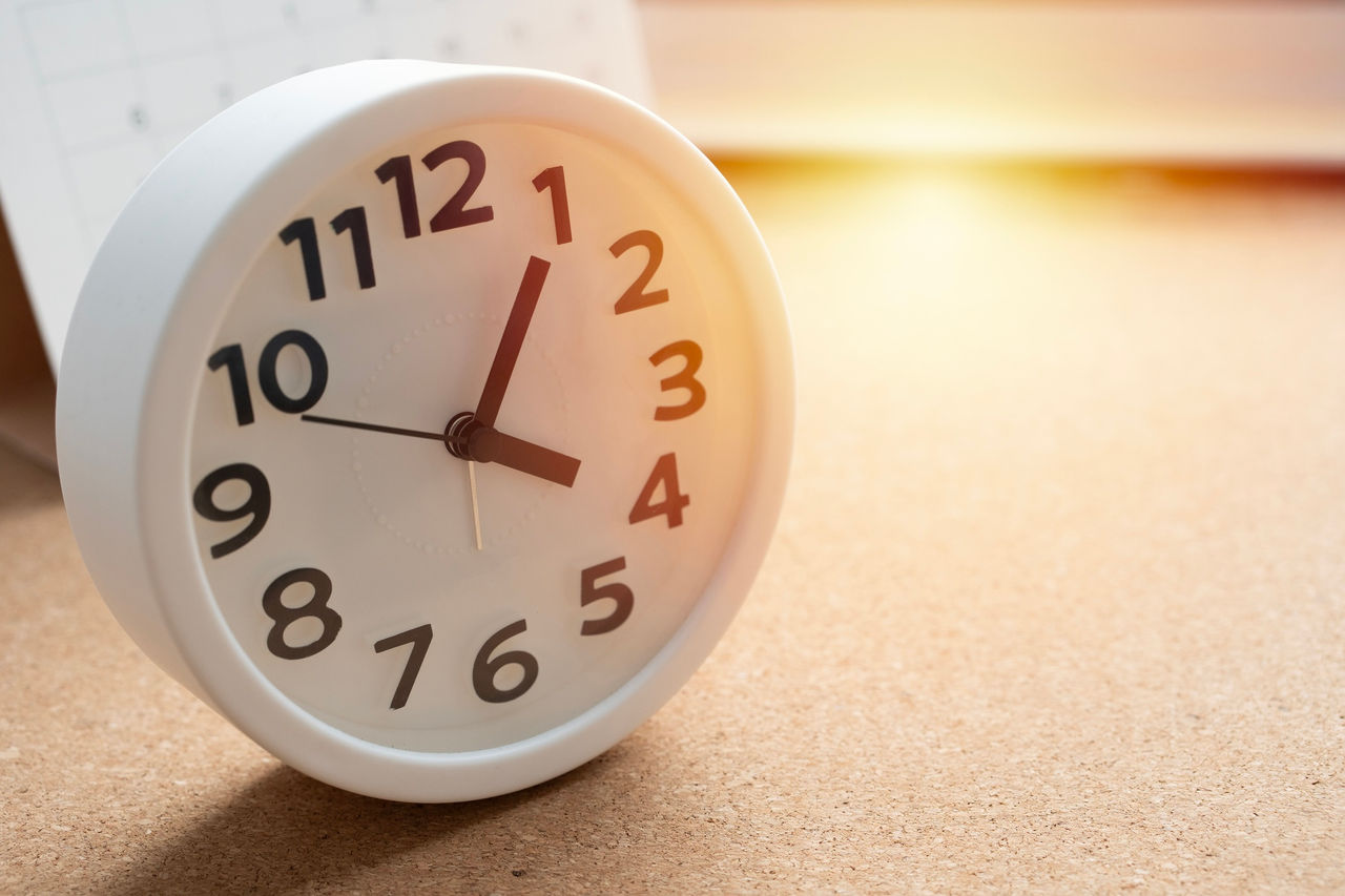 Retro alarm clock on a nightstand