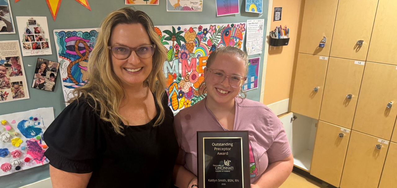 Preceptor Kaitlyn Smith receiving her award from Dr. Jamie Heck