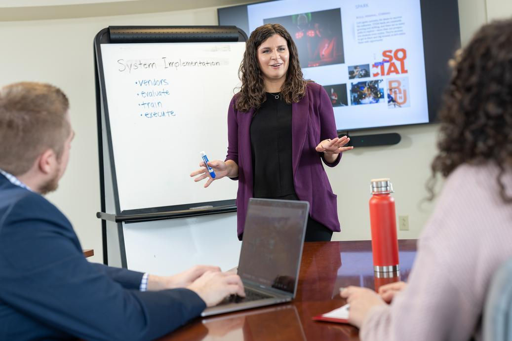 UC employees in a meeting at one of the best employers in Ohio, the University of Cincinnati