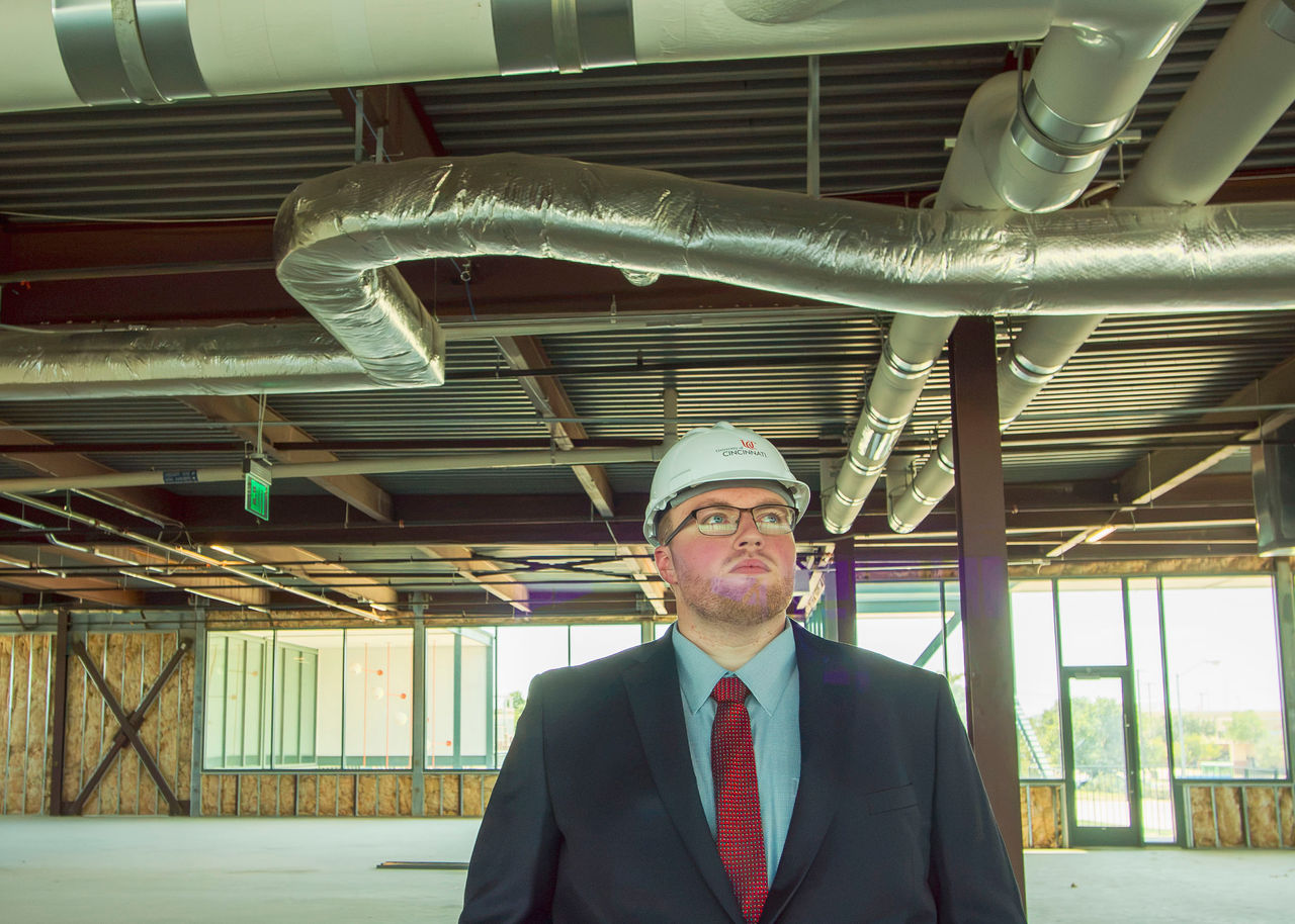 Jeremy Ackley studies an HVAC system. 