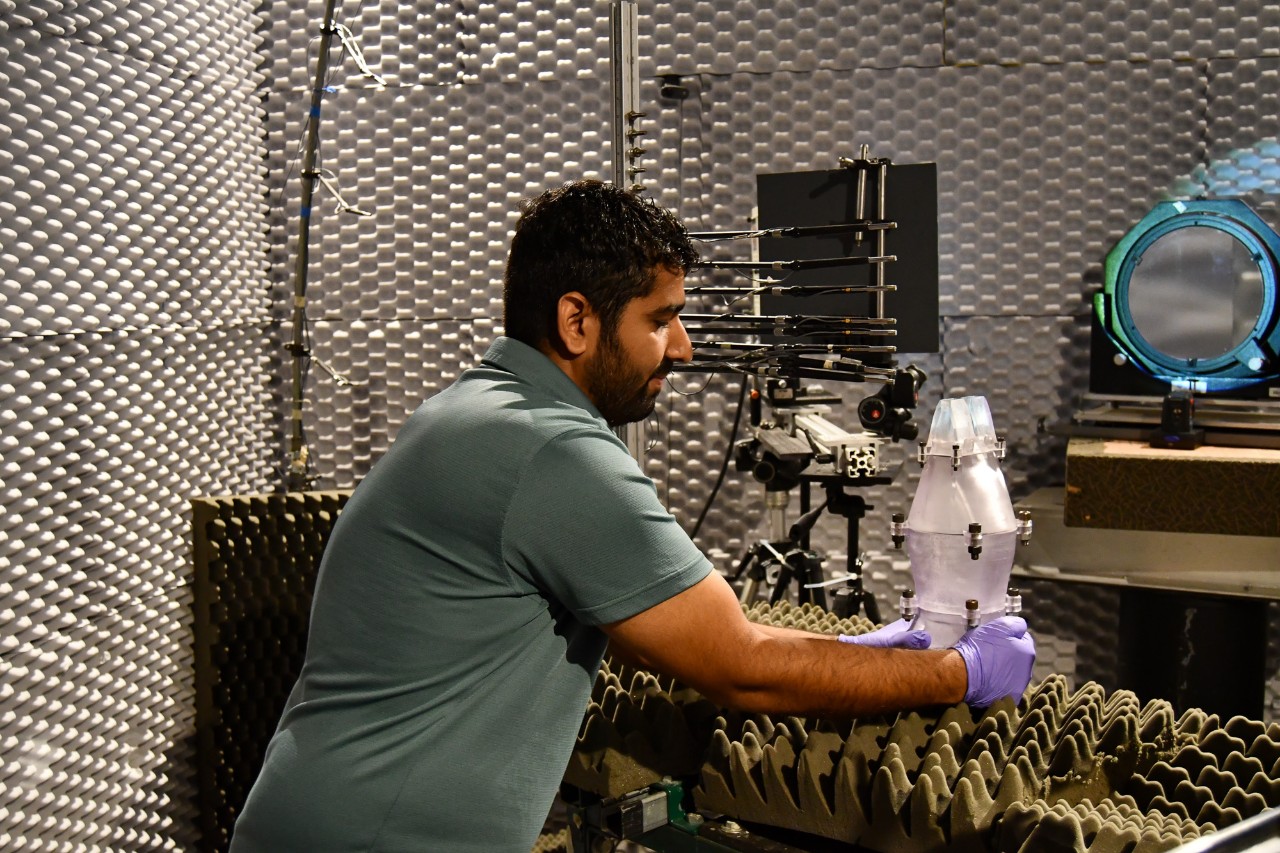 Kaurab Gautam works with jet components in the lab. 
