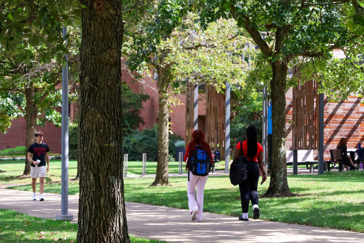 students walking outside on the UC Blue Ash campus