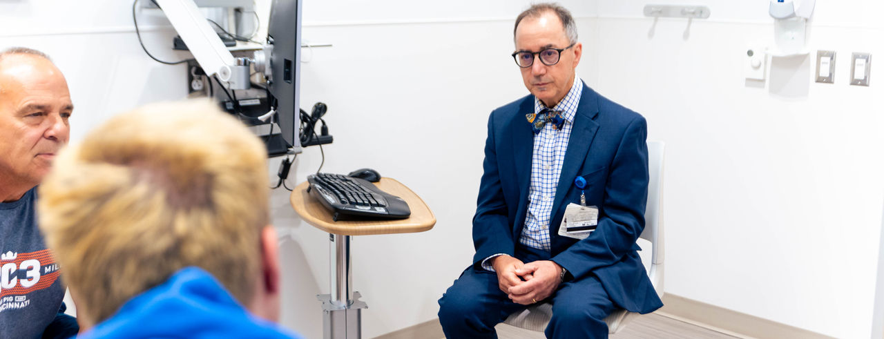 Michael Privitera, MD, with patients at the UC Epilepsy Center.