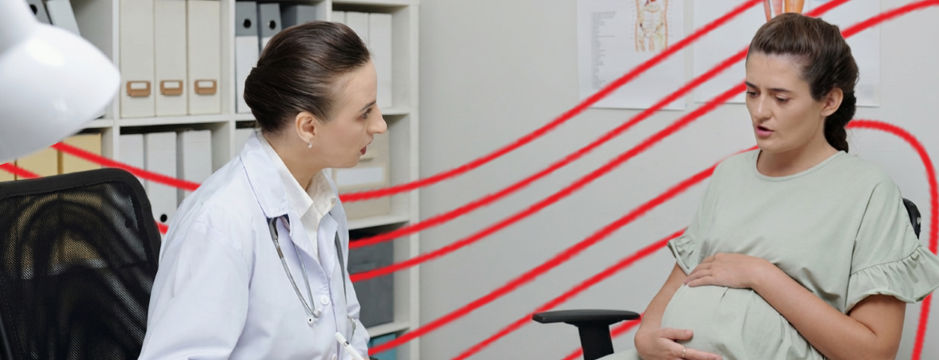 pregnant woman talking to women's health np