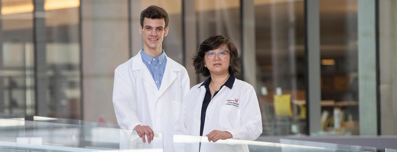 Aleksandr Taranov, PhD, and Agnes (Yu) Luo, PhD, inside a building on the medical campus