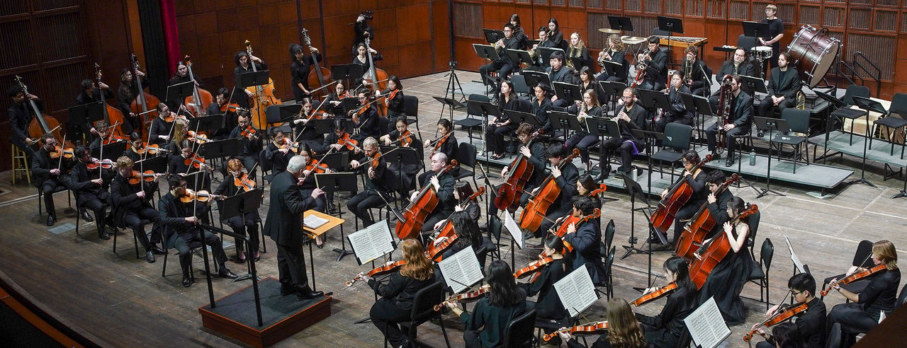 CCM Philharmonia performs on stage. 