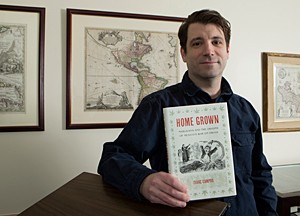 Isaac Campos. Campos is features in this photo with his book,
