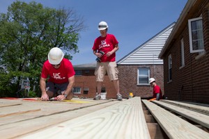 University of Cincinnati faculty and staff work during UC Serves 2015. UC/Joseph Fuqua II