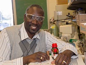 James Mack, a UC associate professor of chemistry, demonstrates 