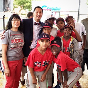 Image of President Ono, Wendy Yip-Ono and baseball youth