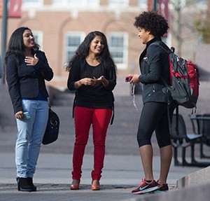 Students standing on campus
