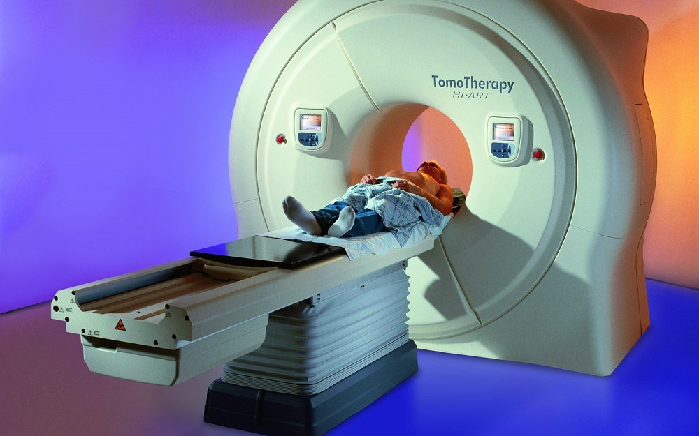 The TomoTherapy Hi-Art System combines the three-dimensional imaging of
computerized tomography X-ray scans with highly targeted radiation beams in a large treatment field. 