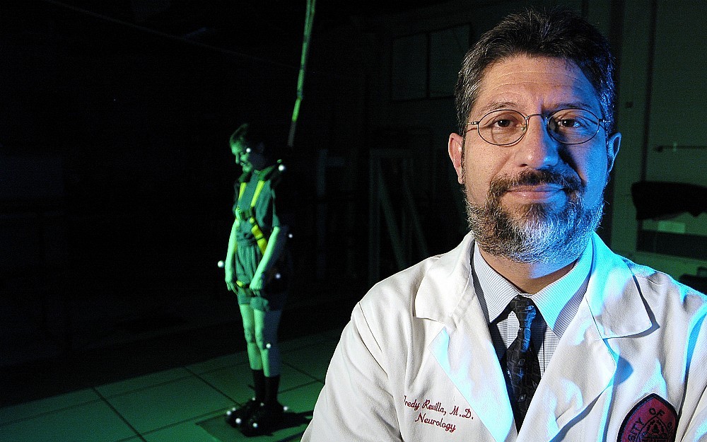 Fredy Revilla, MD, in the deparment of environmental health's biomechanics-ergonomics research laboratory.