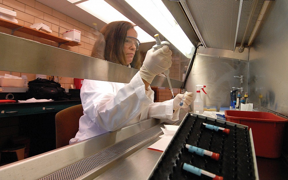 Researcher Sandy Roda tests blood for trace metals. She is helping Erin Haynes, DrPH, determine if Marietta residents are being exposed to dangerous metal emissions.