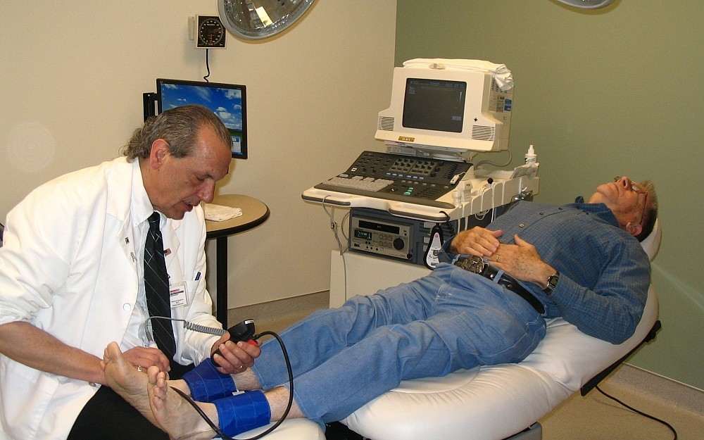 A patient gets an  ankle blood pressure test to detect blockages in the legs at the 2006 UC Heart & Vascular Center. 
