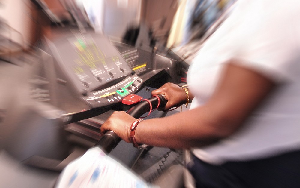 Wiping down community gym equipment can help prevent skin infections. 