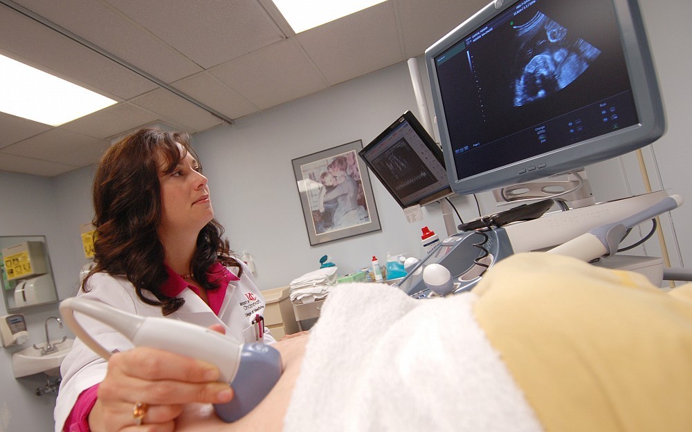 Emily DeFranco, DO, is an obestetrician-gynecologist pursuing a master's in clinical and translational research. 