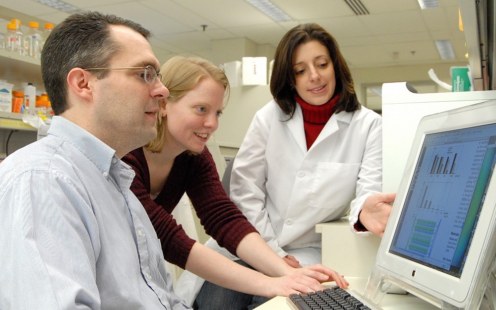 Andrew Herr, PhD, with study co-first authors Deborah Conrady and Cristin Brescia, PhD.
