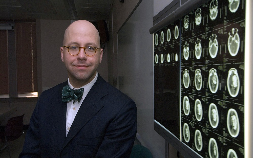 Matthew Flaherty, MD, is studying the effects of the blood-thinning drug warfarin on stroke patients.