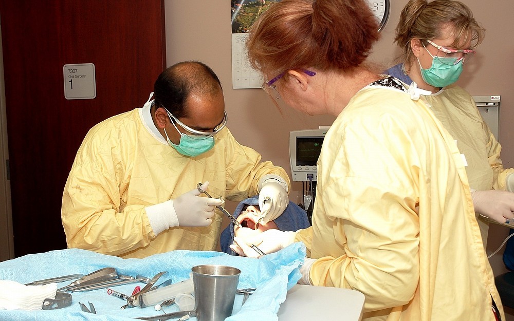 Deepak Krishnan, DDS, performing a procedure