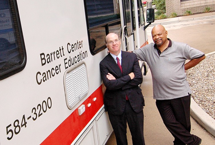 William Barrett, MD, medical director of the UC Health Barrett Center and chair of radiation oncology at UC, with patient advocate Hershel Chalk.