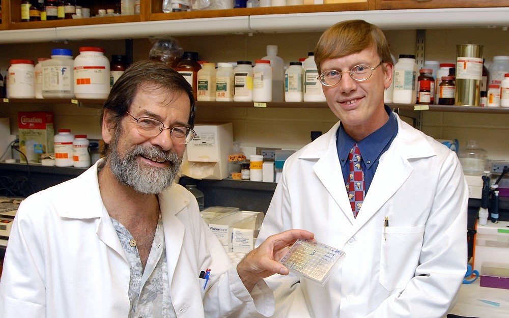 Andrew Norman, PhD (right), with collaborator W. James Ball, PhD.