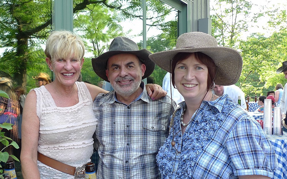 George Atweh, MD (center), with his wife, Josee, and horse trainer, Donna, at the 2011 American Cancer Society Cattle Baron's Ball. 