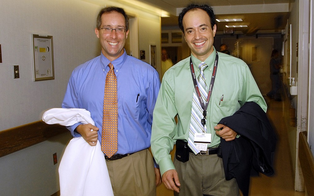 Nathan Schmulewitz, MD (left), and Alberto Espay, MD, are collaborating on a clinical trial that investigates a new method of delivering a Parkinson's disease medication.