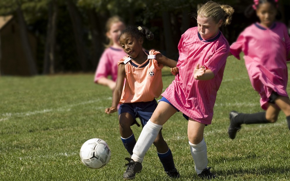 Kids playing soccer