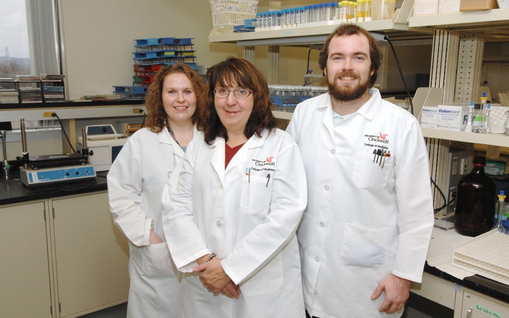 Laura Woollett, PhD (center), with Sandra Rebholz and Thomas Jones, of UC's Metabolic Diseases Institute on the UC Reading Campus.
