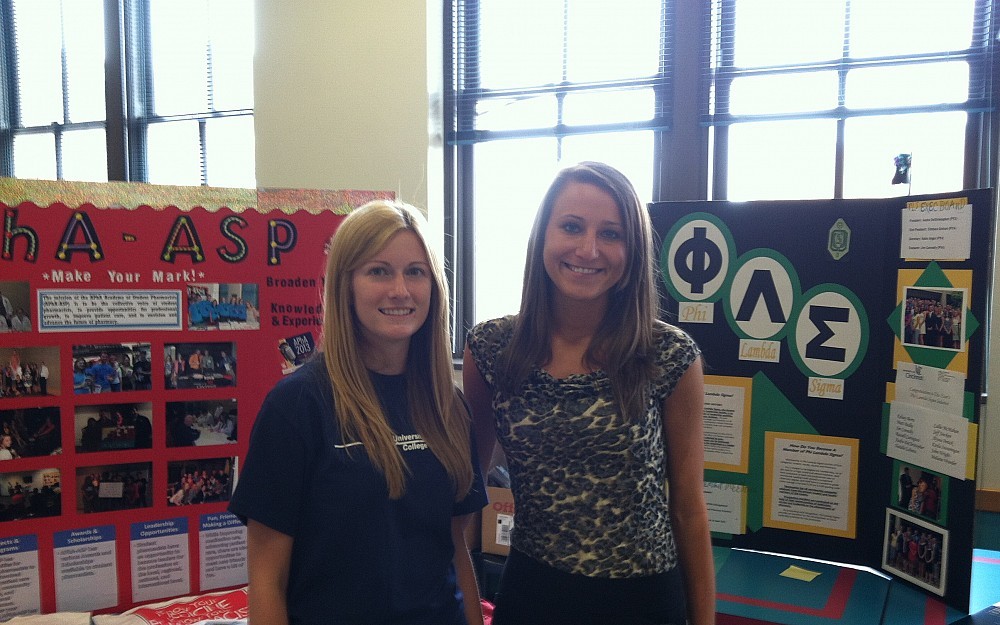Third-year PharmD students Jennifer Hanify and Audra DeChristopher manned booths at the 2012 "Taste of Pharmacy" event. 