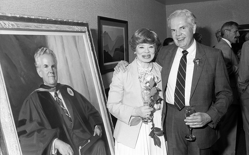Robert Daniels, MD, and his wife, Vikki Ashley, PhD, at the unveiling of his dean portrait in 1987. 