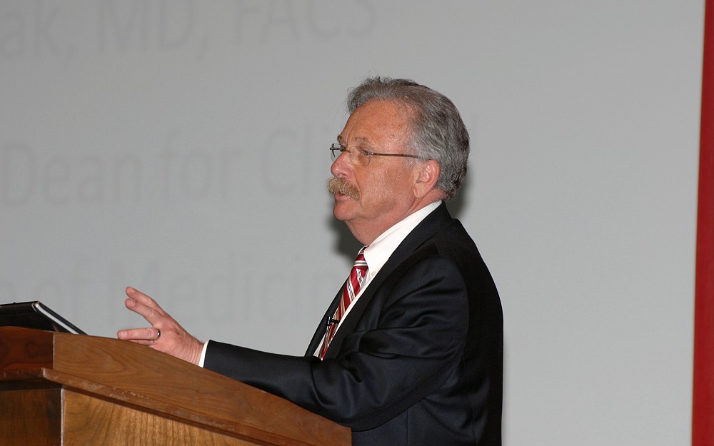 Myles Pensak, MD, delivering presentation April 7, 2014