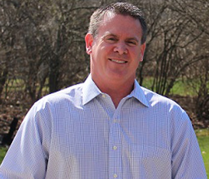 David Childress, 41, can stand tall and smile after acupuncture helped his back problems.