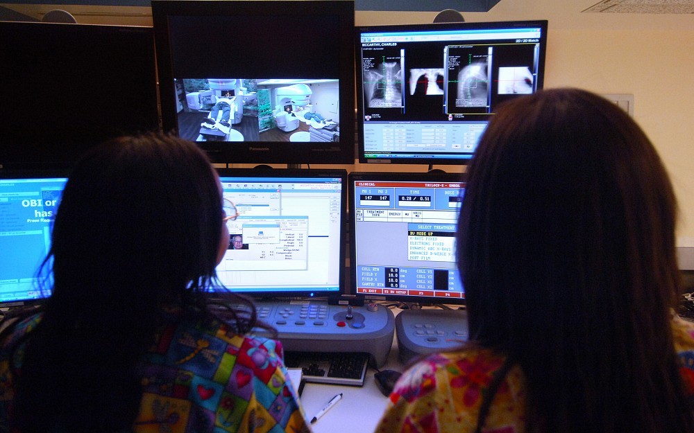 Technicians analyzing data. 