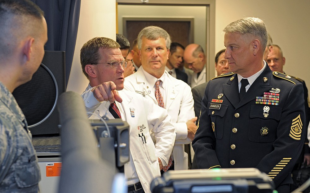 Director of the division of trauma and critical care Jay Johannigman, MD, with Sgt Major Raymond Chandler of the U.S. Army