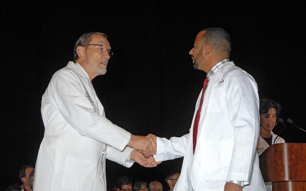 Dean Thomas Boat Welcomes First-year Med Student Yasmany Cartaya.