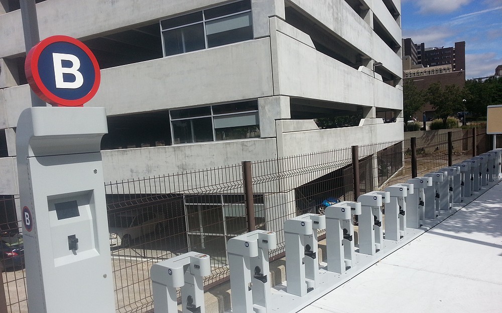A Red Bike station on Goodman Drive awaits its bicycles.