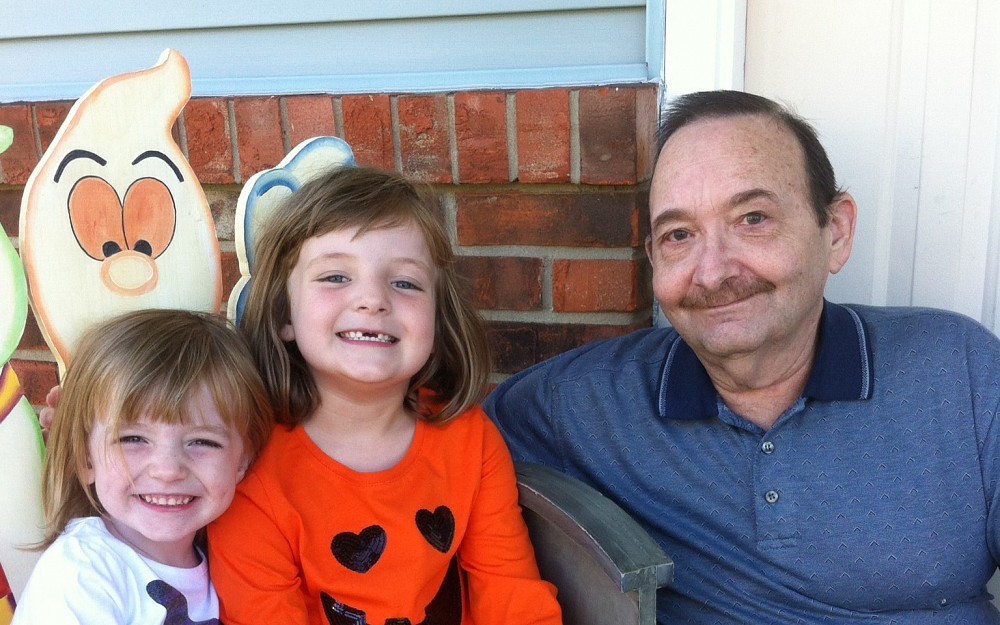 Bruce Hayes with his grand-daughters