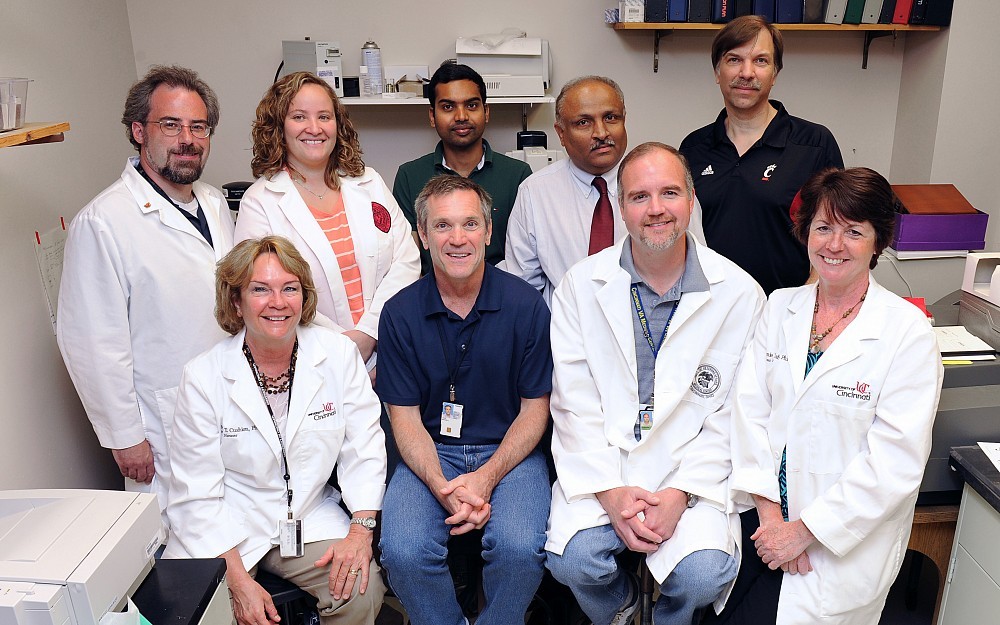 UC research group: Back Row: Tom Sesterhenn, Keeley Lynch, Hari  Ananthula, Pankaj Desai, Larry Sallans; Front Row: Melanie Cushion, Mike Linke, Alan Ashbaugh, Margaret Collins
