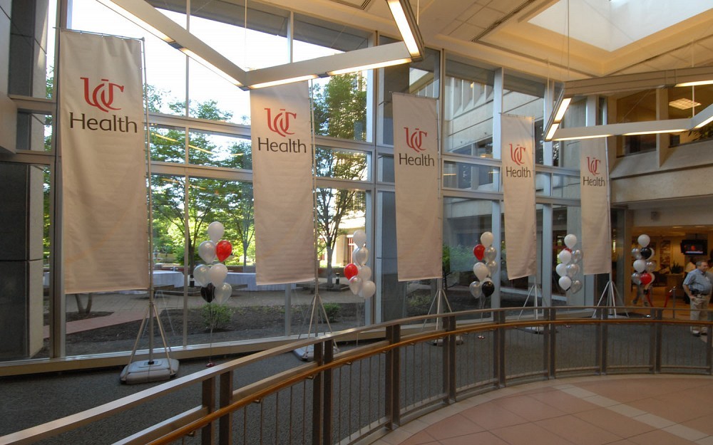 UC Health banners in the lobby of UC Medical Center.
